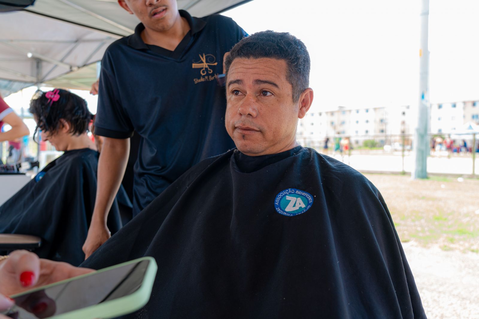 Após realizar um corte de cabelo, o pedreiro Jardson aprovou o evento